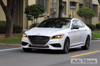 Illustration for article titled Genesis G80 Sport, The Blue Seated Carbon Fiber Trimmed Gold Stiched Steering Wheel Twin-Turbo Sedan All Three Of Us Have Been Waiting For...